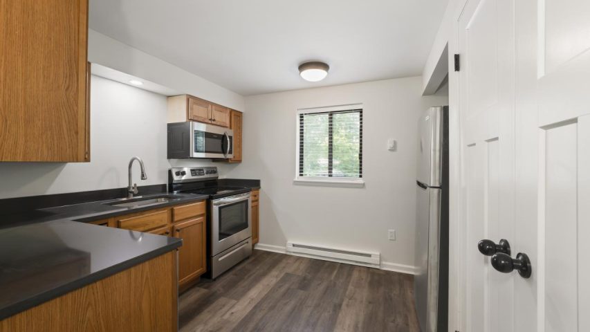 Interior view of the renovated 1-bedroom rental apartment at 255 Main St in the Village of Corinth, NY with modern finishes and comfortable living space.