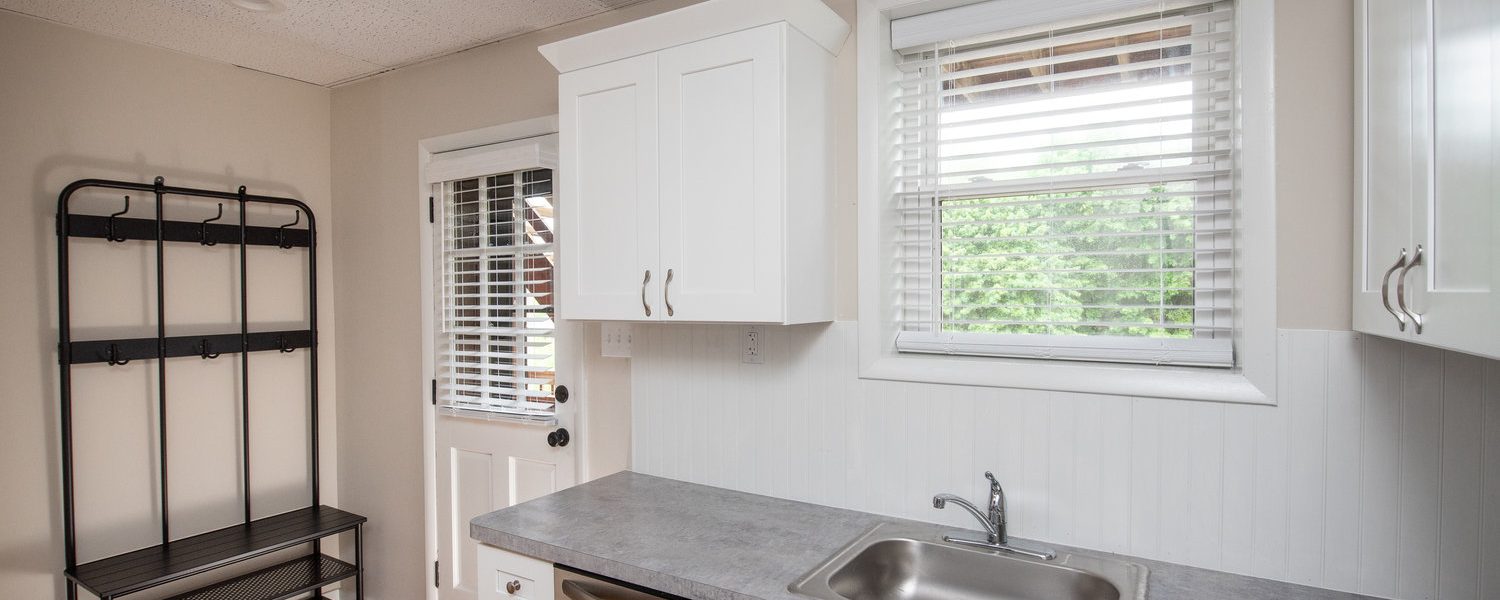 Interior view of the renovated 2-bedroom rental apartment at 19 Warsaw Ave in Mechanicville, NY located in a historic building with modern finishes.