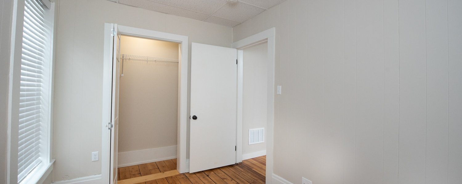 Interior view of the renovated 2-bedroom rental apartment at 19 Warsaw Ave in Mechanicville, NY located in a historic building with modern finishes.