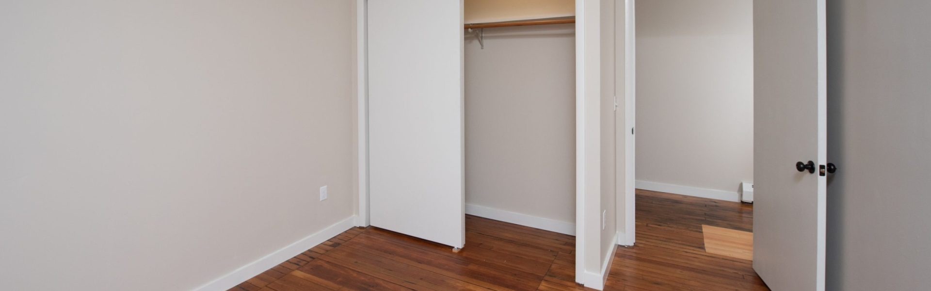 Interior view of a renovated 2-bedroom rental apartment at 19 Warsaw Ave in Mechanicville, NY located inside a historic building with updated finishes.