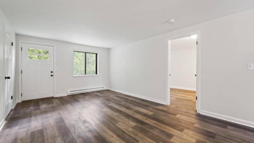 Interior view of the renovated 1-bedroom rental apartment at 255 Main St in the Village of Corinth, NY with modern finishes and comfortable living space.