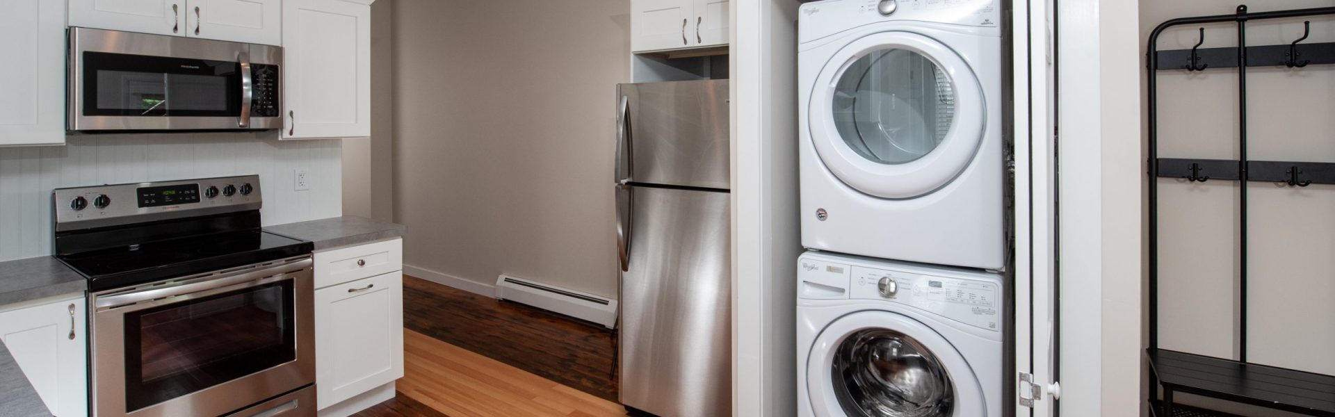 Interior view of a renovated 2-bedroom rental apartment at 19 Warsaw Ave in Mechanicville, NY located inside a historic building with updated finishes.
