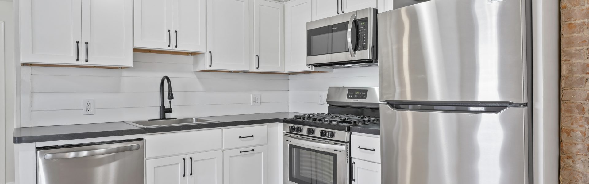Interior view of a modern 2-bedroom plus office rental apartment at 42-44 Saratoga Ave #3W in Mechanicville, NY featuring updated finishes and a dedicated workspace.