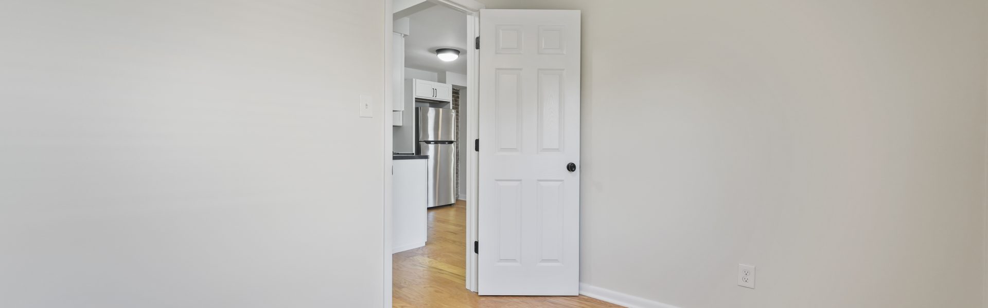Interior view of a modern 2-bedroom plus office rental apartment at 42-44 Saratoga Ave #3W in Mechanicville, NY featuring updated finishes and a dedicated workspace.