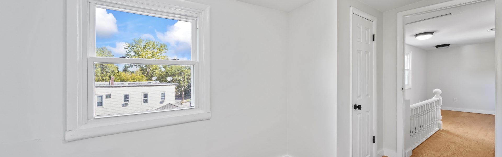 Interior view of a modern 2-bedroom plus office rental apartment at 42-44 Saratoga Ave #3W in Mechanicville, NY featuring updated finishes and a dedicated workspace.
