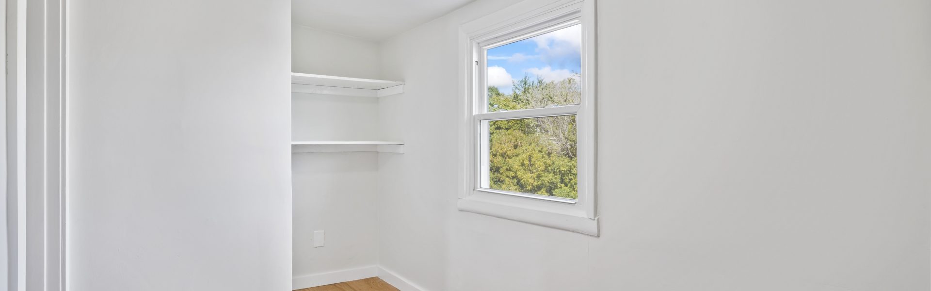 Interior view of a modern 2-bedroom plus office rental apartment at 42-44 Saratoga Ave #3W in Mechanicville, NY featuring updated finishes and a dedicated workspace.