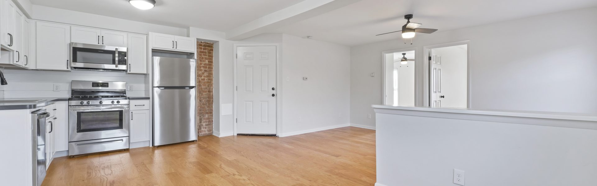 Interior view of a modern 2-bedroom plus office rental apartment at 42-44 Saratoga Ave #3W in Mechanicville, NY featuring updated finishes and a dedicated workspace.