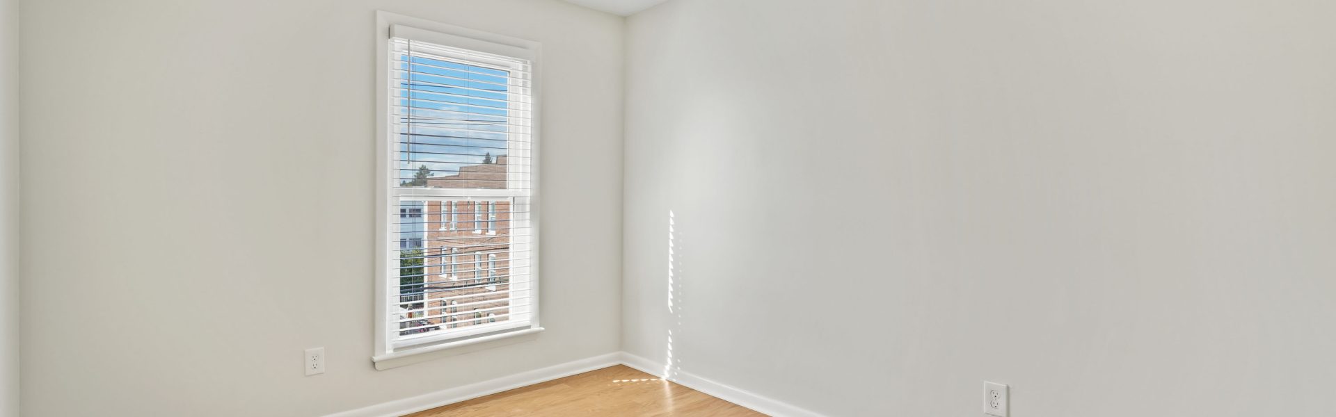 Interior view of a modern 2-bedroom plus office rental apartment at 42-44 Saratoga Ave #3W in Mechanicville, NY featuring updated finishes and a dedicated workspace.