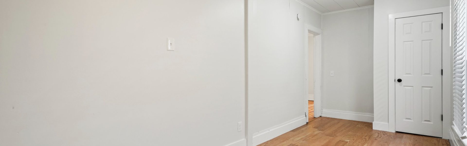 Interior view of the modern 2-bedroom rental apartment at 42-44 Saratoga Ave #2W in Mechanicville, NY featuring updated finishes and spacious living areas.