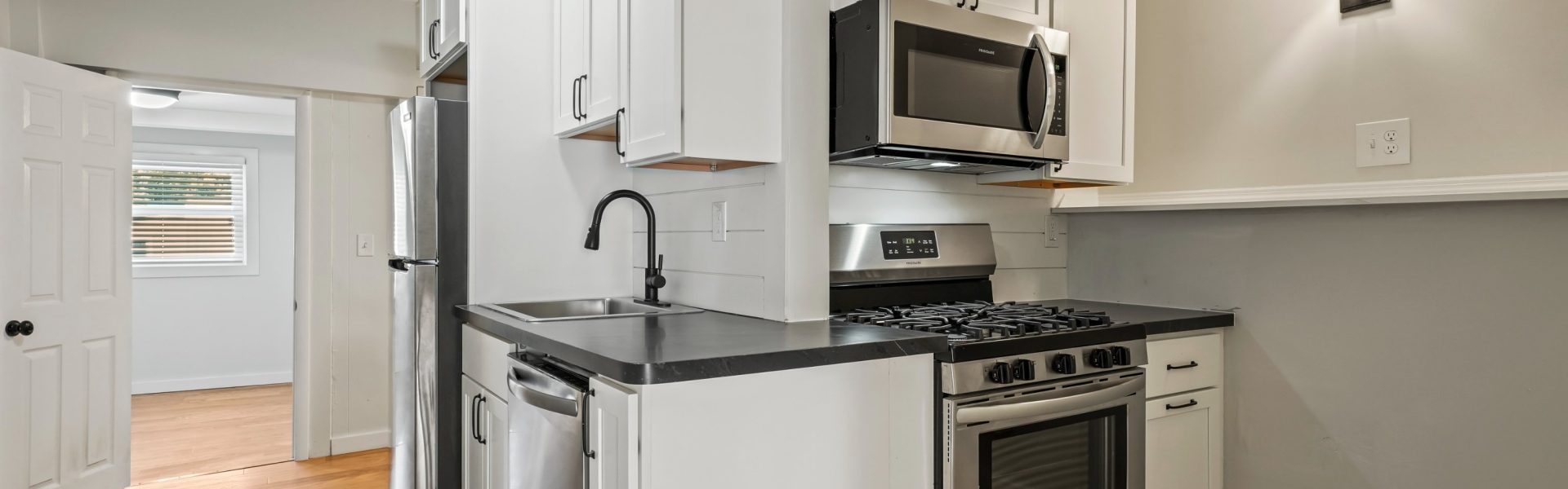 Interior view of the modern 2-bedroom rental apartment at 42-44 Saratoga Ave #2W in Mechanicville, NY featuring updated finishes and spacious living areas.