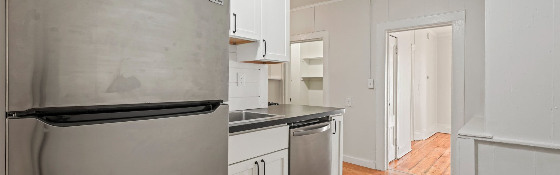 Interior view of the modern 2-bedroom rental apartment at 42-44 Saratoga Ave #2W in Mechanicville, NY featuring updated finishes and spacious living areas.