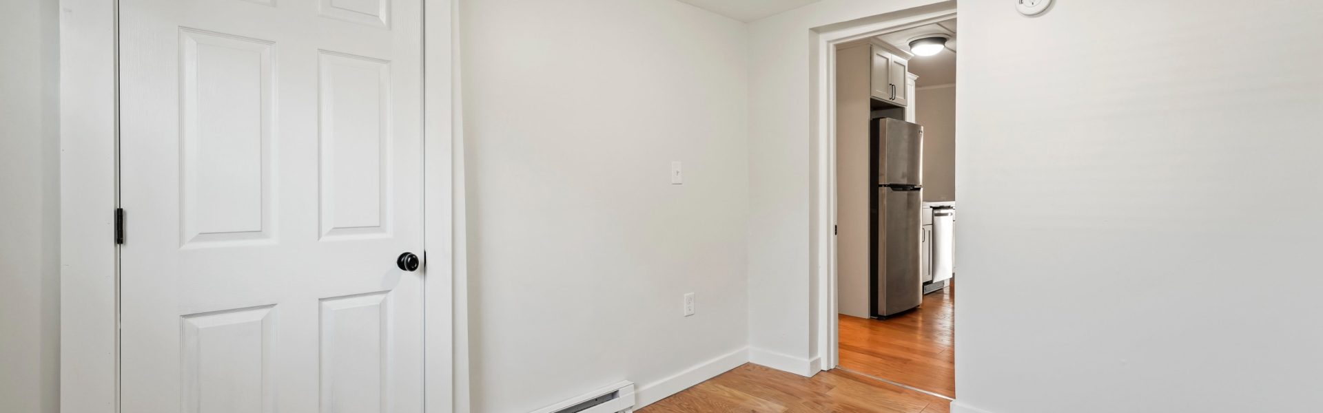Interior view of the modern 2-bedroom rental apartment at 42-44 Saratoga Ave #2W in Mechanicville, NY featuring updated finishes and spacious living areas.