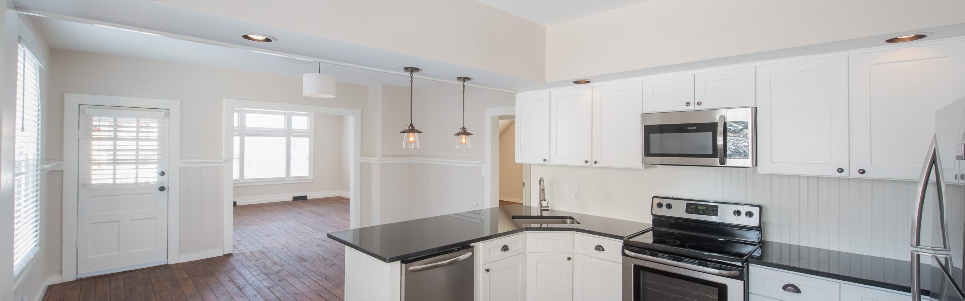 Interior and exterior views of the inviting 2-bedroom apartment at 130 Van Dam St #1 in downtown Saratoga Springs, NY featuring a private entrance and architectural details.