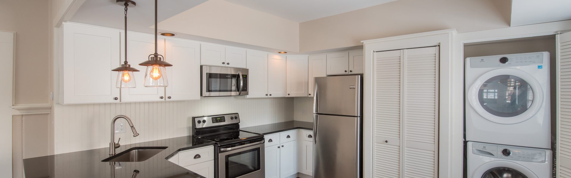 Interior and exterior views of the inviting 2-bedroom apartment at 130 Van Dam St #1 in downtown Saratoga Springs, NY featuring a private entrance and architectural details.
