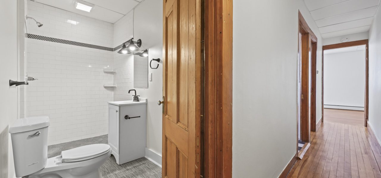 Interior view of a freshly updated 1-bedroom apartment at 33 Franklin St #3 in downtown Saratoga Springs, NY with modern finishes and walkable access to shops and dining.