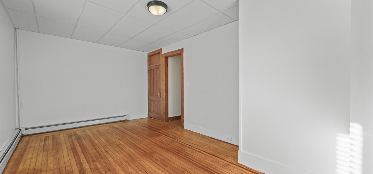 Interior view of a freshly updated 1-bedroom apartment at 33 Franklin St #3 in downtown Saratoga Springs, NY with modern finishes and walkable access to shops and dining.