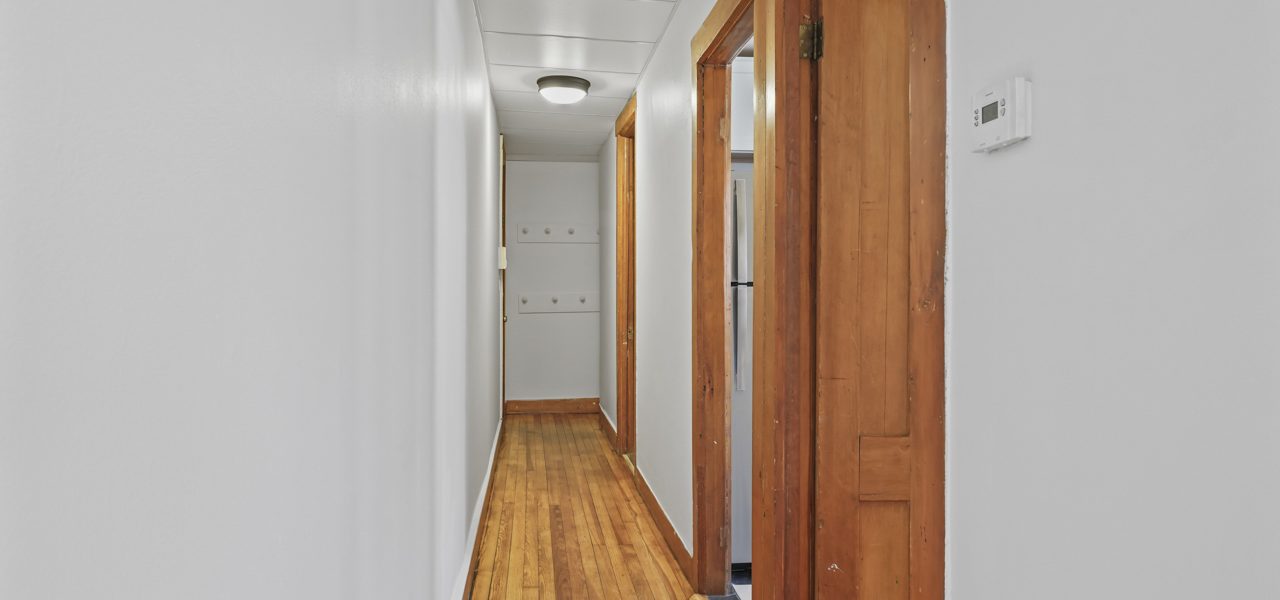 Interior view of a freshly updated 1-bedroom apartment at 33 Franklin St #3 in downtown Saratoga Springs, NY with modern finishes and walkable access to shops and dining.