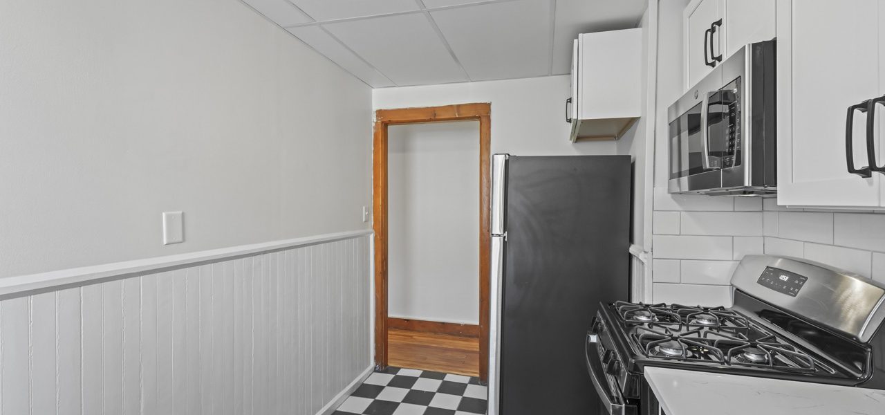 Interior view of a freshly updated 1-bedroom apartment at 33 Franklin St #3 in downtown Saratoga Springs, NY with modern finishes and walkable access to shops and dining.