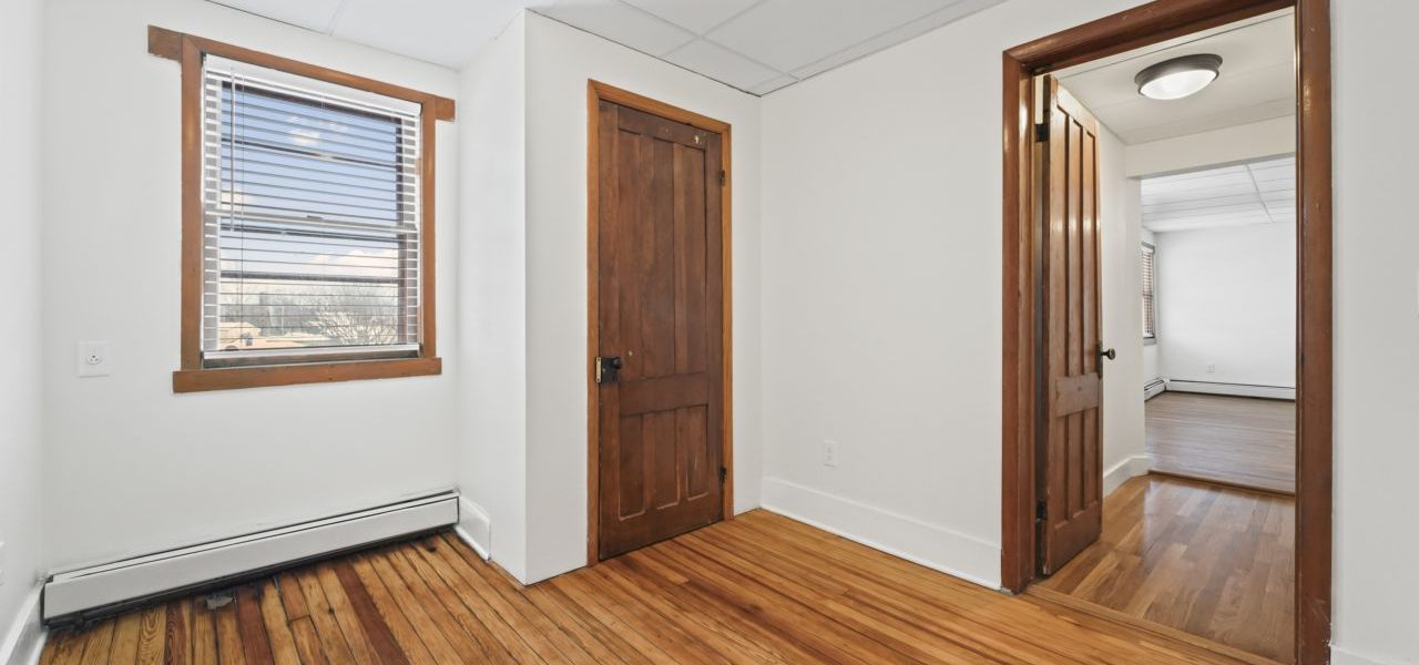 Interior view of a freshly renovated 2-bedroom apartment at 33 Franklin St #8 in downtown Saratoga Springs, NY with modern finishes and walkable access to local amenities.
