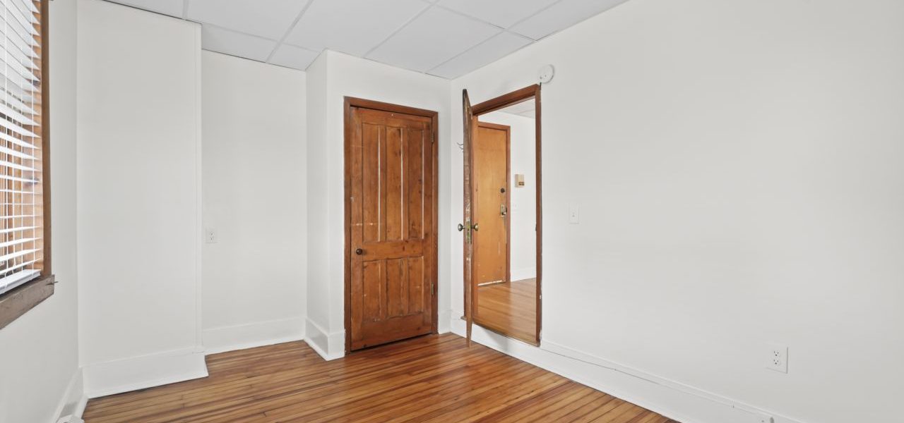 Interior view of a freshly renovated 2-bedroom apartment at 33 Franklin St #8 in downtown Saratoga Springs, NY with modern finishes and walkable access to local amenities.
