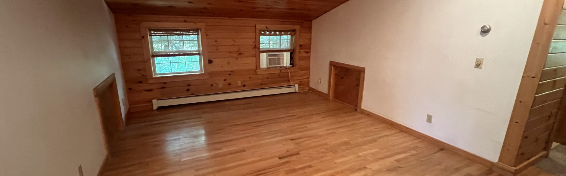 Interior view of a charming 1-bedroom carriage house apartment at 101 King Rd #B in Saratoga Springs, NY, near downtown shops and dining.