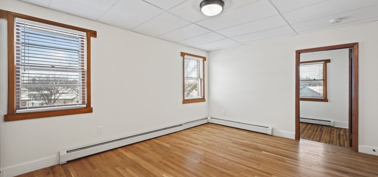 Interior view of a freshly renovated 2-bedroom apartment at 33 Franklin St #8 in downtown Saratoga Springs, NY with modern finishes and walkable access to local amenities.