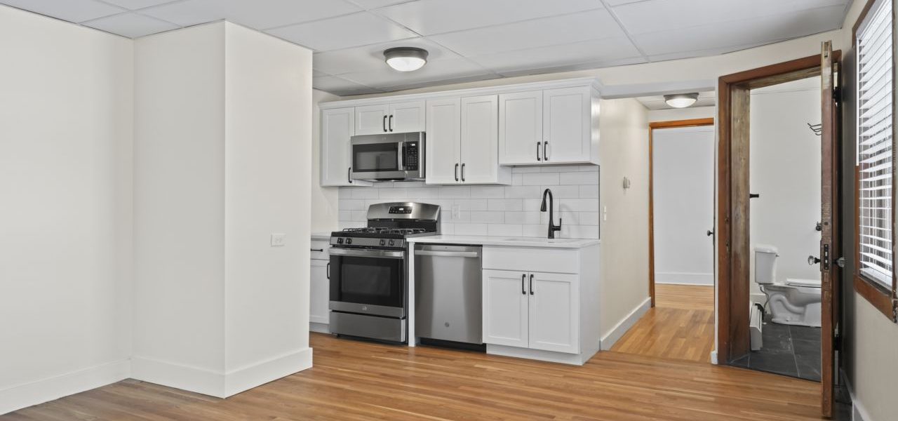 Interior view of a freshly renovated 2-bedroom apartment at 33 Franklin St #8 in downtown Saratoga Springs, NY with modern finishes and walkable access to local amenities.