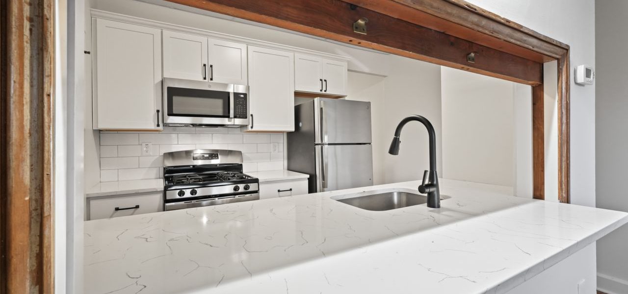 Interior view of a warm and stylish 1-bedroom apartment at 33 Franklin St #2 in downtown Saratoga Springs, NY with updated finishes and walkable access to shops and dining.