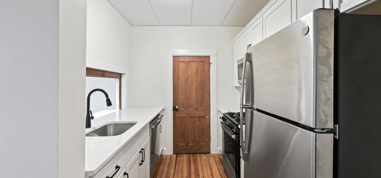 Interior view of a warm and stylish 1-bedroom apartment at 33 Franklin St #2 in downtown Saratoga Springs, NY with updated finishes and walkable access to shops and dining.