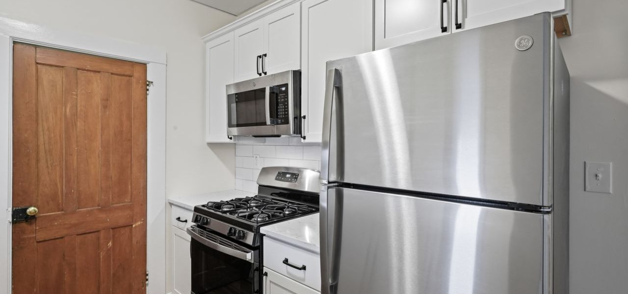 Interior view of a warm and stylish 1-bedroom apartment at 33 Franklin St #2 in downtown Saratoga Springs, NY with updated finishes and walkable access to shops and dining.