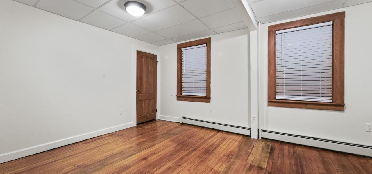 Interior view of a warm and stylish 1-bedroom apartment at 33 Franklin St #2 in downtown Saratoga Springs, NY with updated finishes and walkable access to shops and dining.