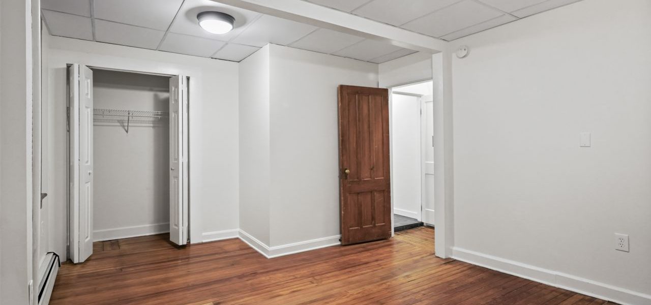 Interior view of a warm and stylish 1-bedroom apartment at 33 Franklin St #2 in downtown Saratoga Springs, NY with updated finishes and walkable access to shops and dining.