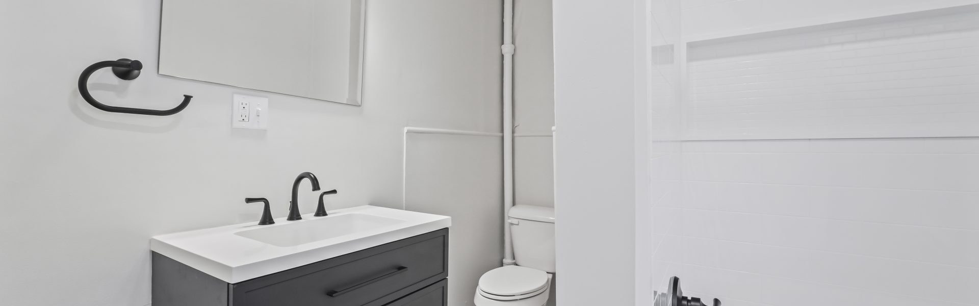 Interior view of a newly renovated 1-bedroom apartment at 2 New St #4 in South Glens Falls, NY, featuring updated flooring, modern finishes, and bright natural light.