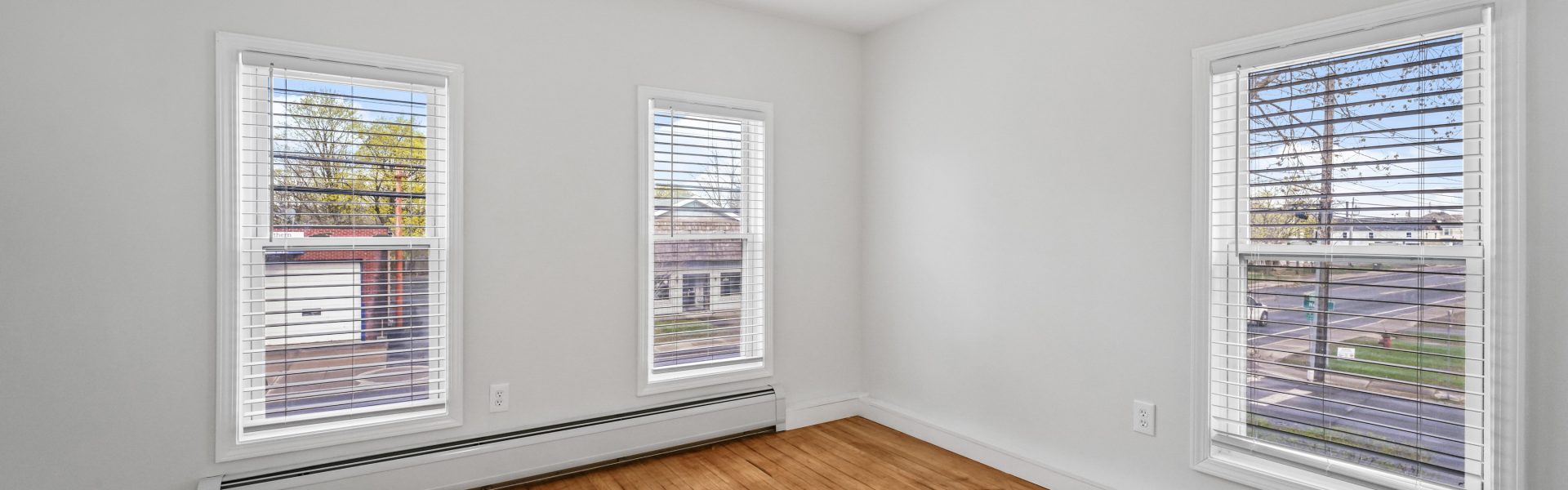 Interior view of a newly renovated 1-bedroom apartment at 35 Saratoga Ave #1 in South Glens Falls, NY, featuring modern finishes and bright natural light.