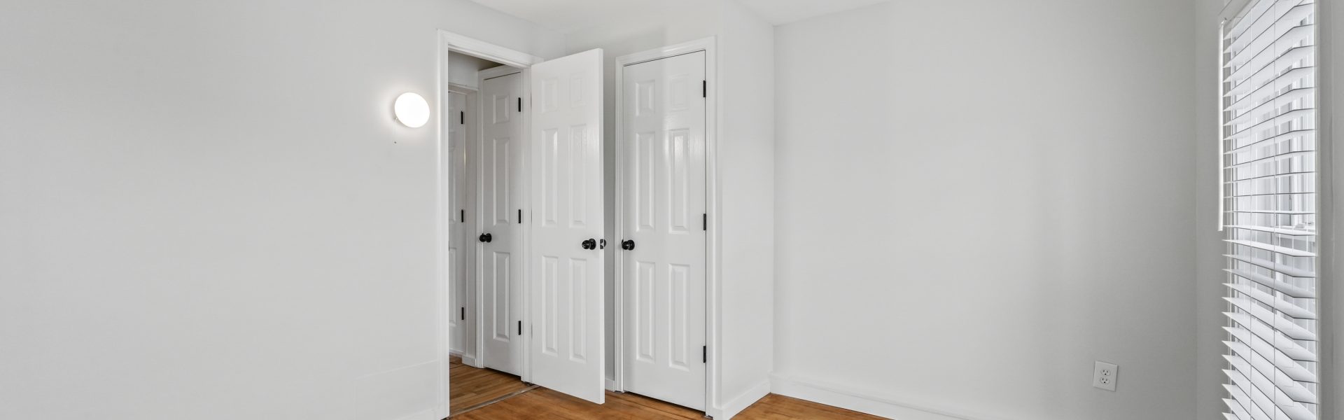 Interior view of a newly renovated 1-bedroom apartment at 35 Saratoga Ave #1 in South Glens Falls, NY, featuring modern finishes and bright natural light.