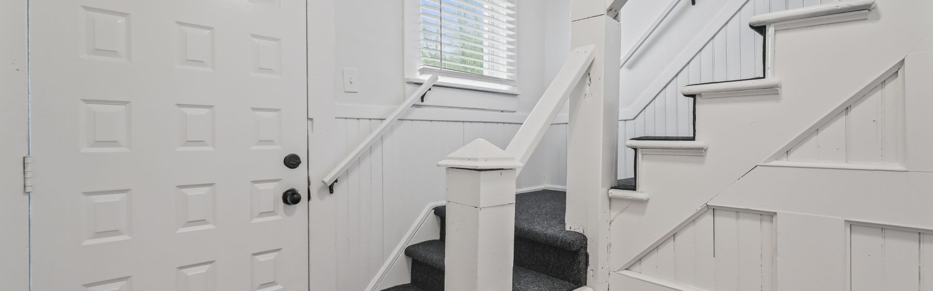 Interior view of a newly renovated 1-bedroom apartment at 2 New St #4 in South Glens Falls, NY, featuring updated flooring, modern finishes, and bright natural light.