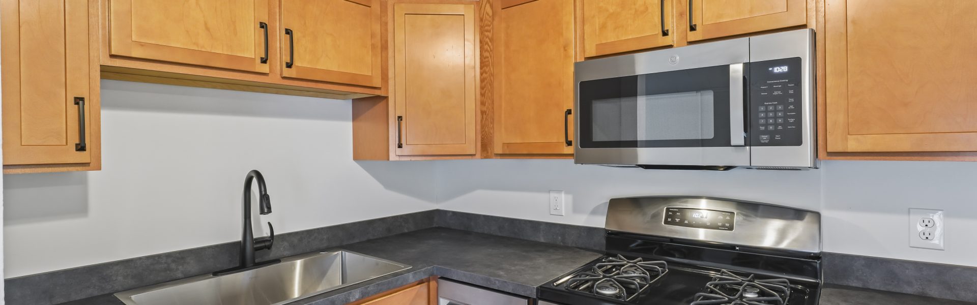 Interior view of a newly renovated 1-bedroom apartment at 2 New St #4 in South Glens Falls, NY, featuring updated flooring, modern finishes, and bright natural light.