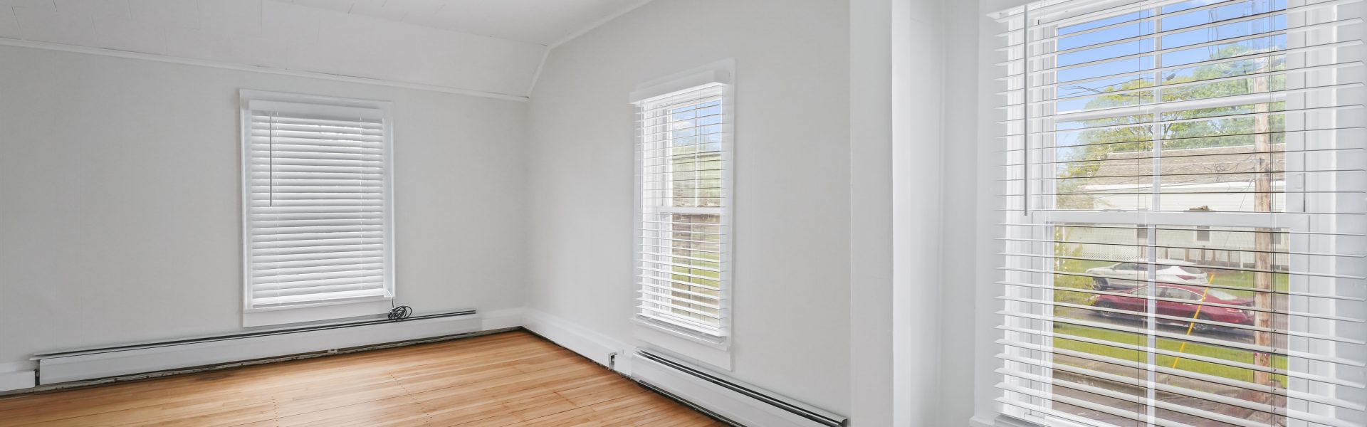 Interior view of a newly renovated 1-bedroom apartment at 2 New St #4 in South Glens Falls, NY, featuring updated flooring, modern finishes, and bright natural light.