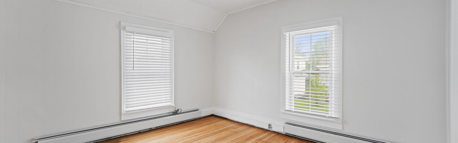 Interior view of a newly renovated 1-bedroom apartment at 2 New St #4 in South Glens Falls, NY, featuring updated flooring, modern finishes, and bright natural light.