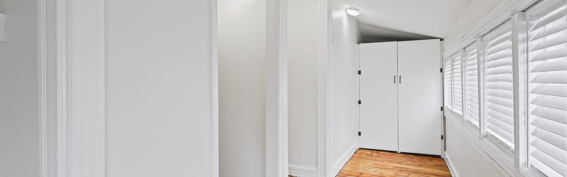 Interior view of a newly renovated 1-bedroom apartment at 2 New St #4 in South Glens Falls, NY, featuring updated flooring, modern finishes, and bright natural light.