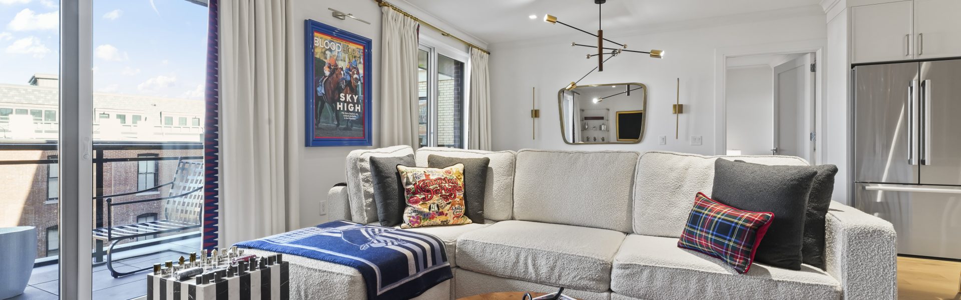 Living room at 365 Broadway in Saratoga Springs with modern finishes and natural light