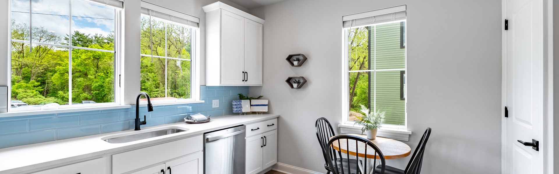 Modern kitchen details at The Ridge featuring stainless steel appliances and updated cabinetry