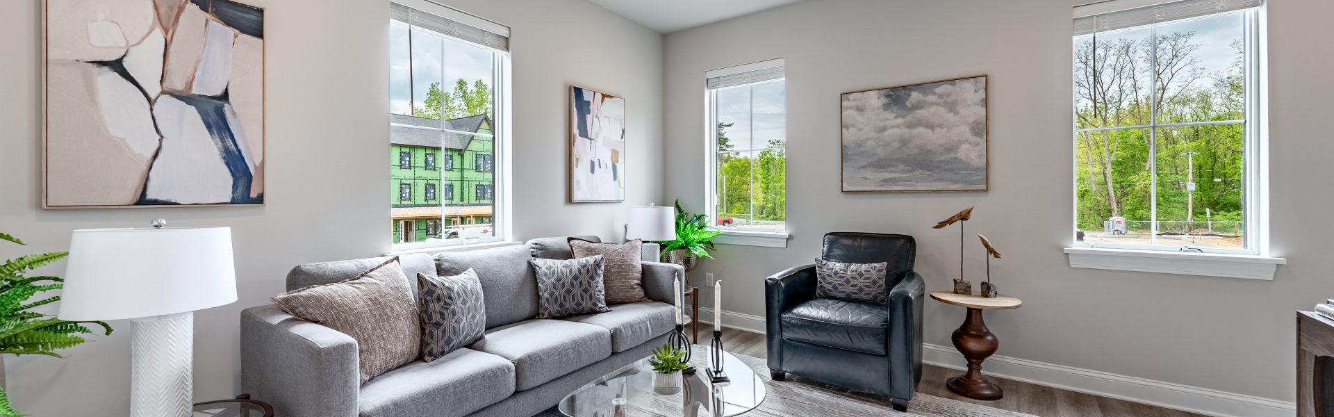 Spacious living room inside The Ridge rental residence with modern finishes