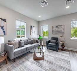 Spacious living room inside The Ridge rental residence with modern finishes
