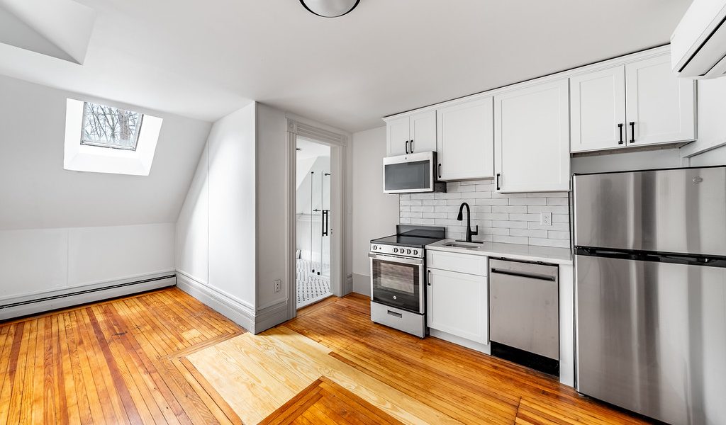 Skidmore Mansion Apartments Saratoga Springs NY with renovated interiors managed by Green Springs Property Management.