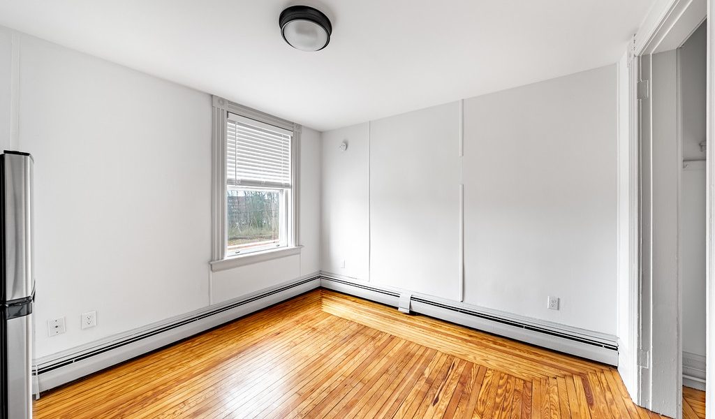 Skidmore Mansion Apartments Saratoga Springs NY with renovated interiors managed by Green Springs Property Management.