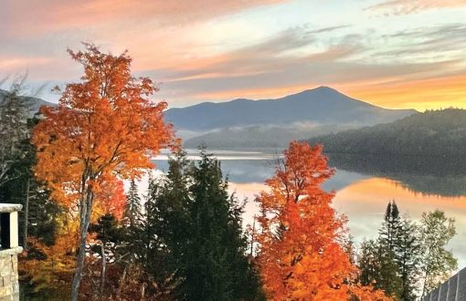 Landscape with colorful trees, lake, and mountains in Upstate New York